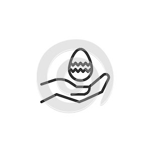 Hand with Easter egg line icon