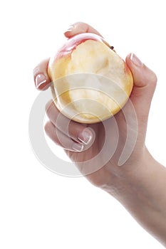 Hand with eaten apple