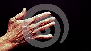 Hand of elderly black person