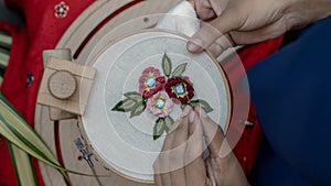 Hand Embroidering on Hoops Outdoors. Top View