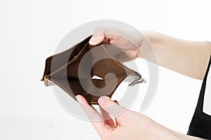 Hand with an empty wallet isolated on white background, Bankruptcy