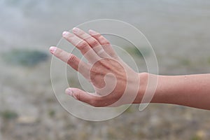 Hand without engagement ring with suntan. The girl took off the wedding ring on vacation that no one knew that she was married