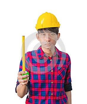 Hand of engineer is holding tape measure in his hands and wear yellow safety helmet plastic on white background