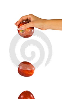 Hand with falling apple