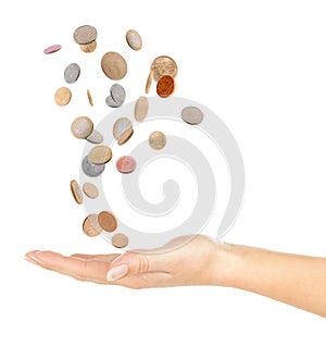 Hand and falling coins