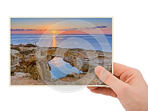 Hand and Famous stone Sin Bridge at sunrise in Ayia Napa Cyprus my photo