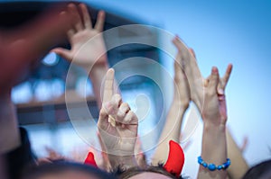 Hand fans during a concert