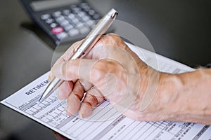 Hand filling retirement claim application