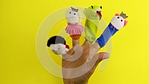 Hand with finger puppet theatre