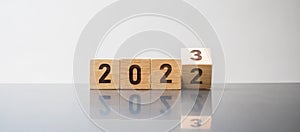 Hand flip 2022 to 2023 block. goal, Resolution, strategy, plan,, motivation, reboot, forecast, change, countdown and New Year