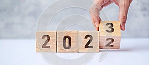 Hand flip 2022 to 2023 block. goal, Resolution, strategy, plan,, motivation, reboot, forecast, change, countdown and New Year