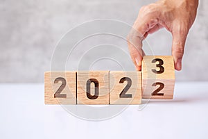 Hand flip 2022 to 2023 block. goal, Resolution, strategy, plan,, motivation, reboot, forecast, change, countdown and New Year