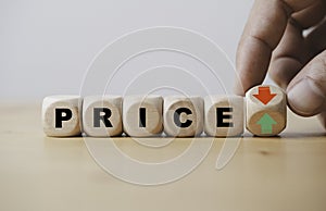 Hand flipping between green up arrow and red down arrow with price wording for product increase and decrease price which related