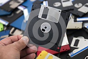 hand with floppy disk