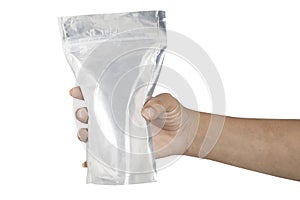 Hand with Foil package bag isolated on white