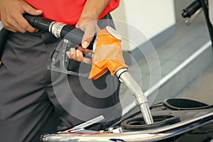 Hand fueling fuel with motorcycle