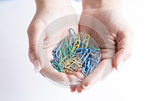 Hand full of paper clips