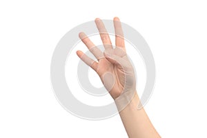 Hand gesture four fingers, isolated on a white background, young female hand close-up