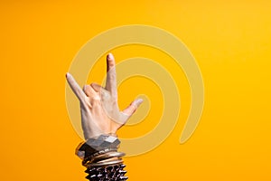 Hand gestures. Thumbs up, that& x27;s a cool gesture of the rocker. photo