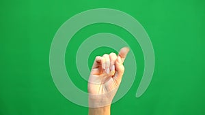 Hand gestures. Touchscreen. Female hand showing multitouch gestures in green screen