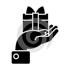 Hand with gift icon, vector illustration, black sign on isolated background
