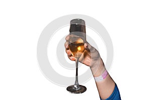The hand of girl glass of alcoholic beverage on a white background, isolated, holiday atmosphere, weekend