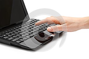 Hand of girl typing on keyboard.