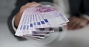 hand give 500 euro banknotes. bank money loan, consumer credit and quick loans