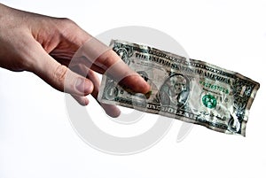 Hand gives dollar bill