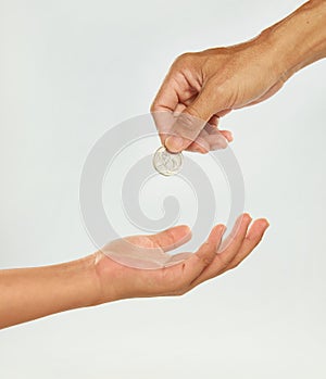 Hand giving coin