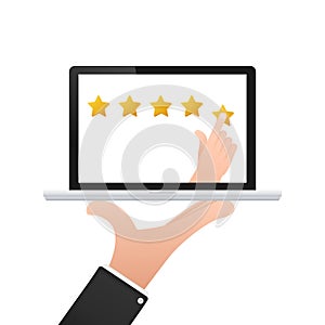 Hand giving a five-star rating on a laptop screen, concept for customer feedback and online review