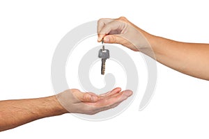 Hand giving a key