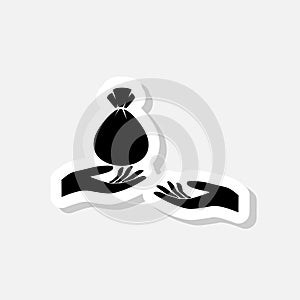 Hand giving money bag to another hand sticker icon