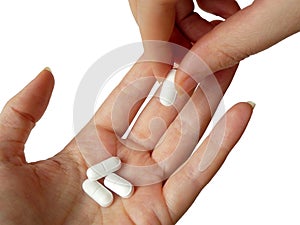 Hand Giving Pills