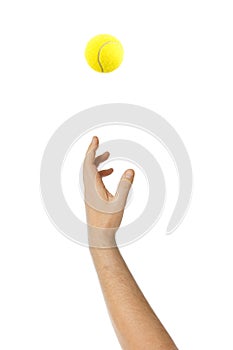 Hand giving service throwing tennis ball photo