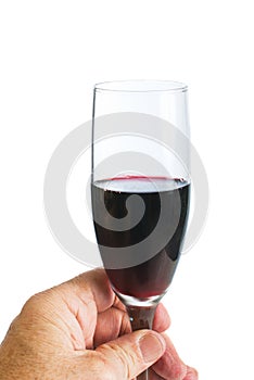 Hand with glass of red wine