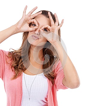 Hand glasses, portrait and woman in studio with funny, silly or goofy personality on white background. Eyes, frame and