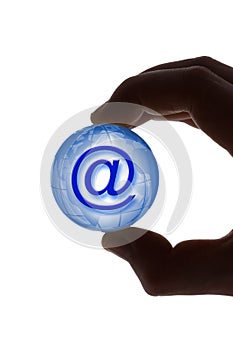Hand with globe and e-mail symbol