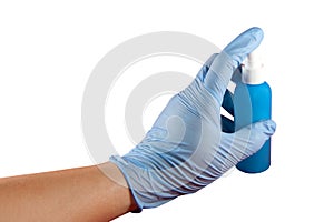 Hand with glove pressing spray can