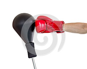 Hand in glove punch a punching ball