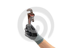 Hand of a gloved man holding a pipe wrench. Isolated white background