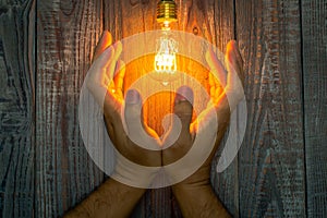Hand with Glowing bulb