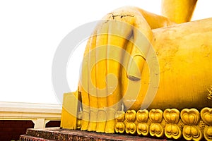 Hand of golden ancient Buddha image in thailand, isolated on white background