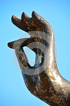 Hand of Golden Buddha statue