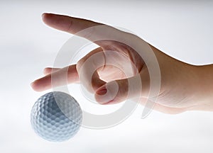 Hand with golf-ball