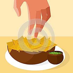 Hand grabbing nachos