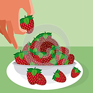 Hand grabbing strawberries