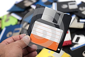 hand with floppy disk