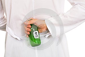 Hand with green bottle photo