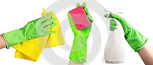Hand in green glove holding washing sponge, cloth wiper for dust and spray bottle isolated on white
